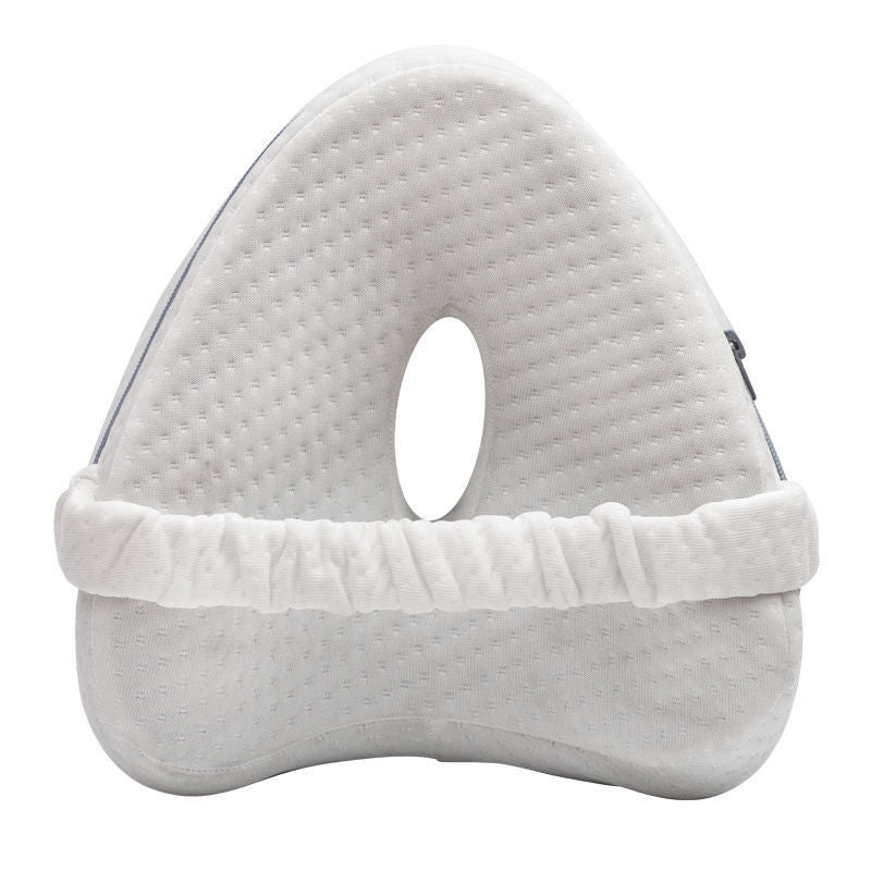 White side-sleeper knee pillow, front view showing heart shape and hollow center on a white background