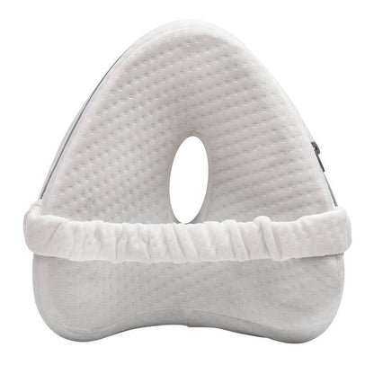 White side-sleeper knee pillow, front view showing heart shape and hollow center on a white background