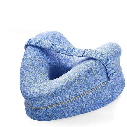 Blue side-sleeper knee pillow, three-quarter studio view on a white background