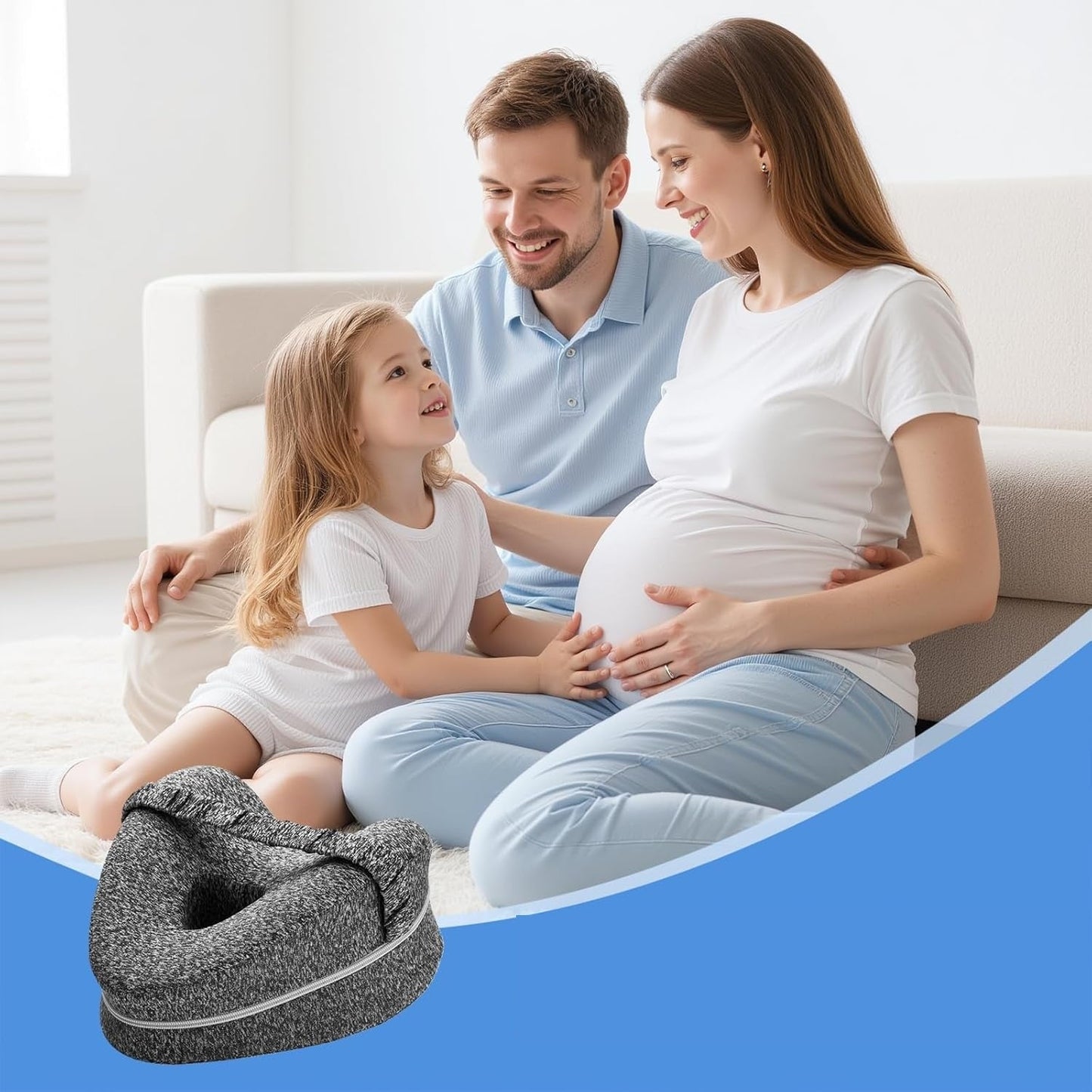 Pregnant woman with her partner and child at home beside the gray knee pillow